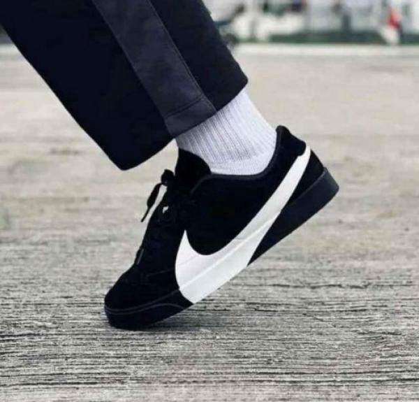 Nike Blazer City Low sneaker in black and white.
